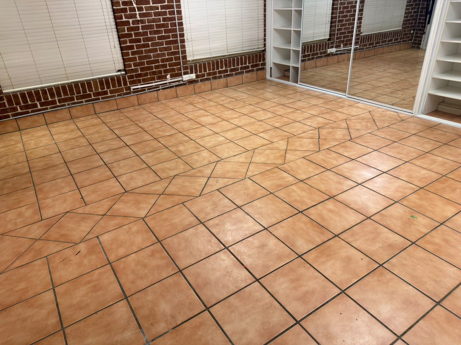 Before: Worn Concrete Garage Floor
